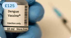 Dengue vaccine vial held in a gloved hand, £125